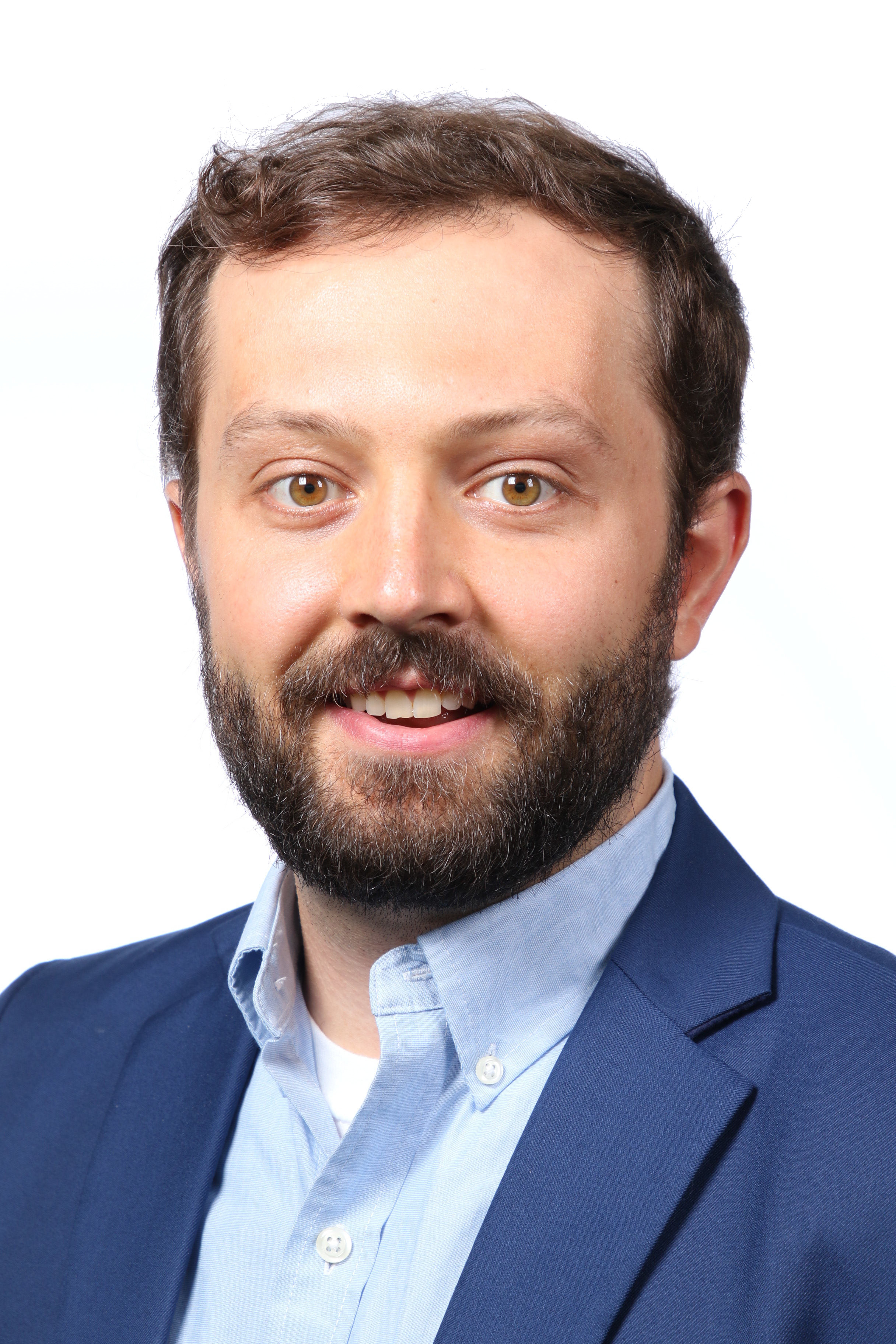 David Buyck speaking at podium